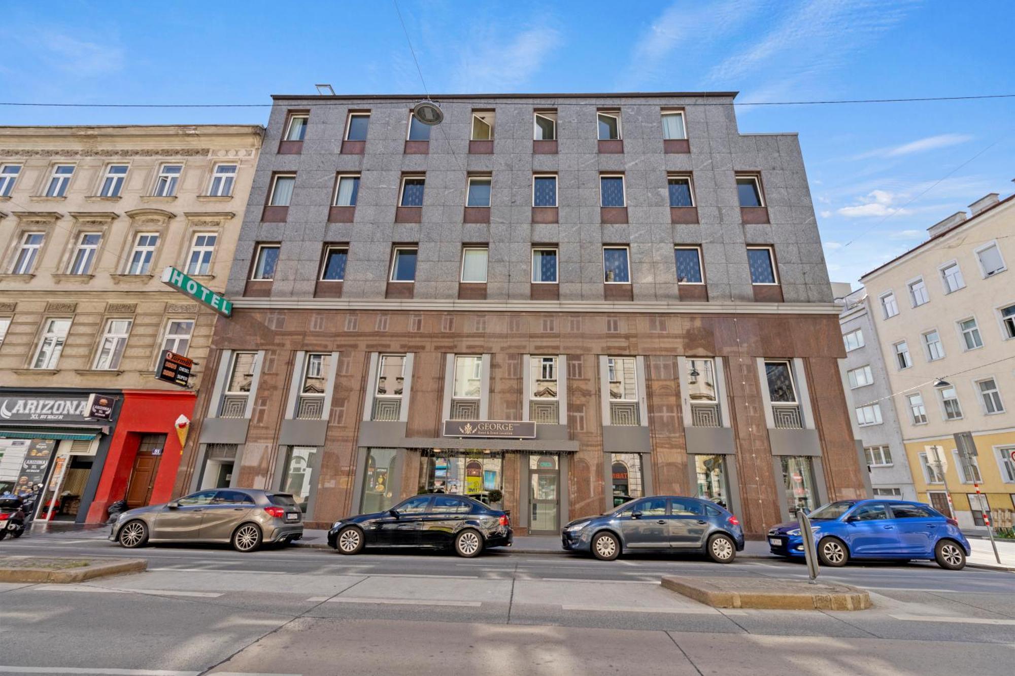 Hotel George Wina Bagian luar foto